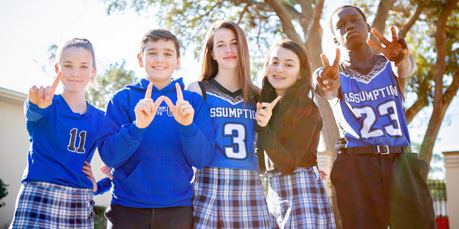 Christian school students standing together in solidarity.